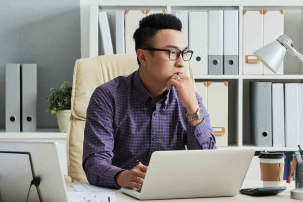 Man working on new project in his office